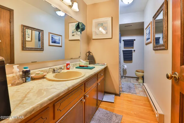 a view of a house with a tree