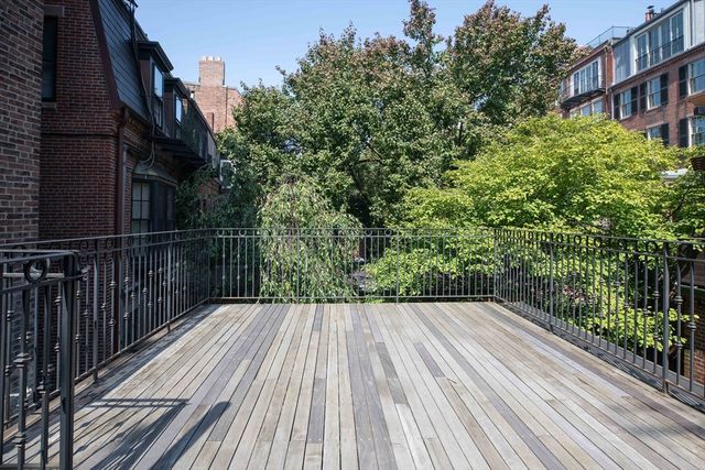 a front view of a building with street view