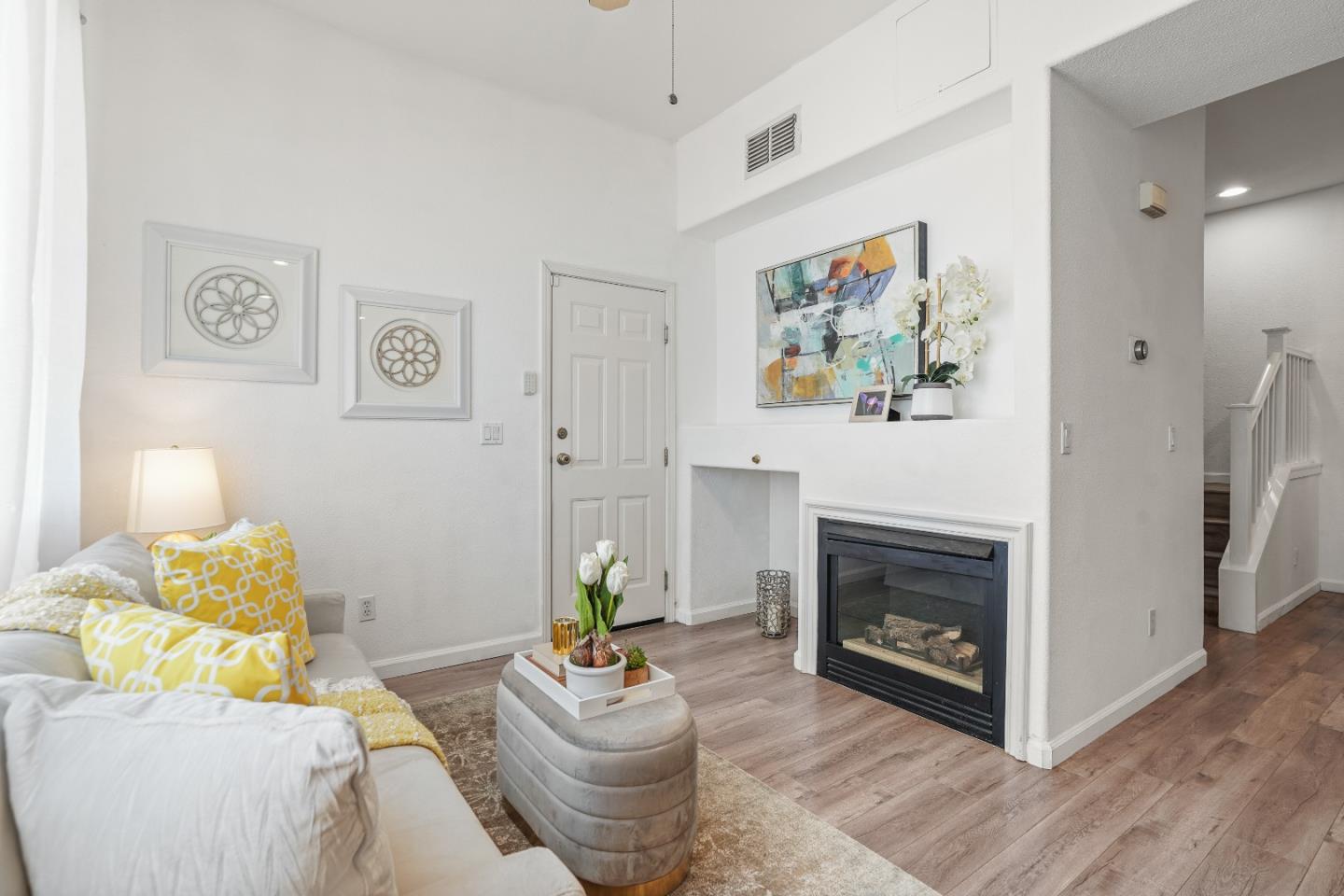 894 Fascination Place Milpitas, CA 95035 - Photo 13 of 30 a living room with furniture and a fireplace
