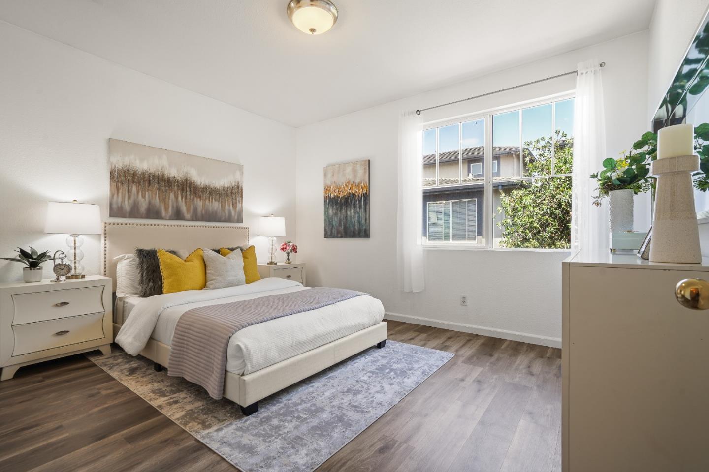 894 Fascination Place Milpitas, CA 95035 - Photo 14 of 30 a bedroom with a large bed and a window