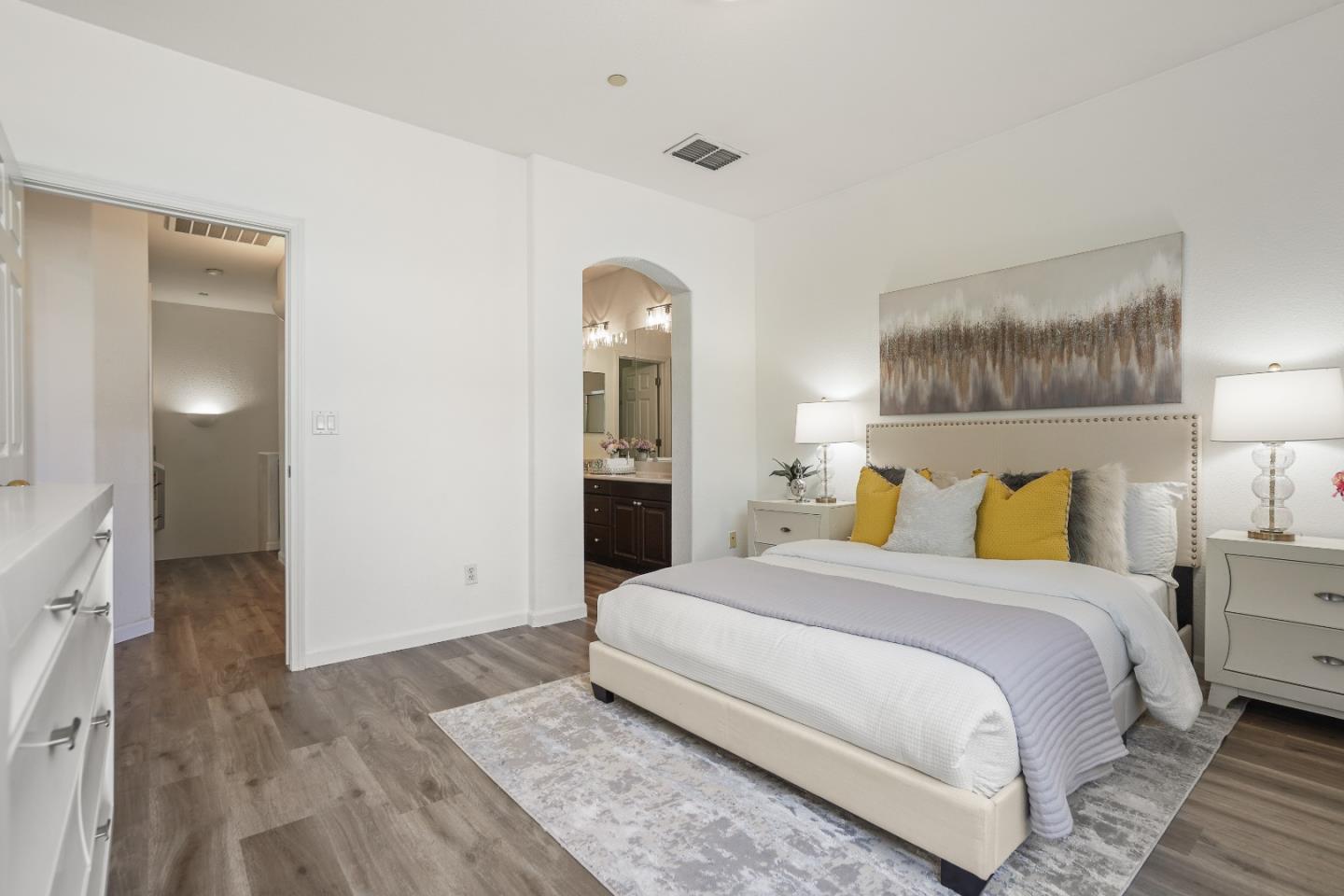 894 Fascination Place Milpitas, CA 95035 - Photo 15 of 30 a spacious bedroom with a bed and a lamp