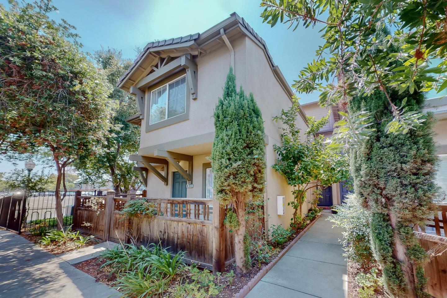 894 Fascination Place Milpitas, CA 95035 - Photo 2 of 30 a front view of a house with a yard