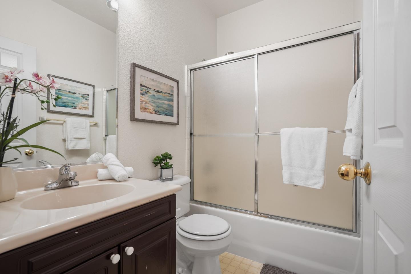 894 Fascination Place Milpitas, CA 95035 - Photo 21 of 30 a bathroom with a sink toilet and a mirror