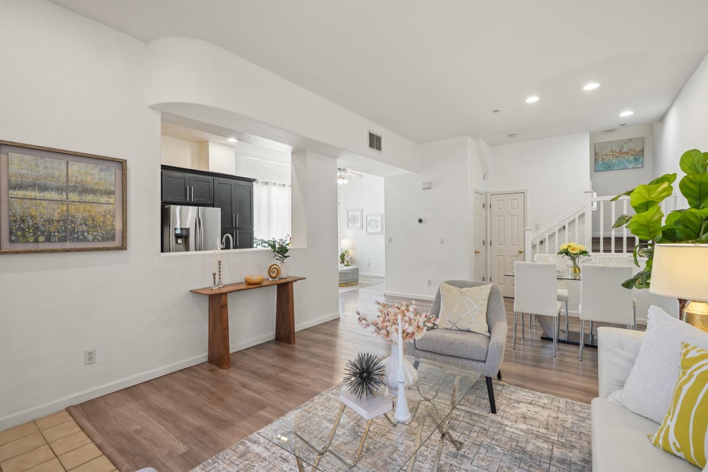 894 Fascination Place Milpitas, CA 95035 - Photo 7 of 30 a living room with furniture a rug and a view of bathroom