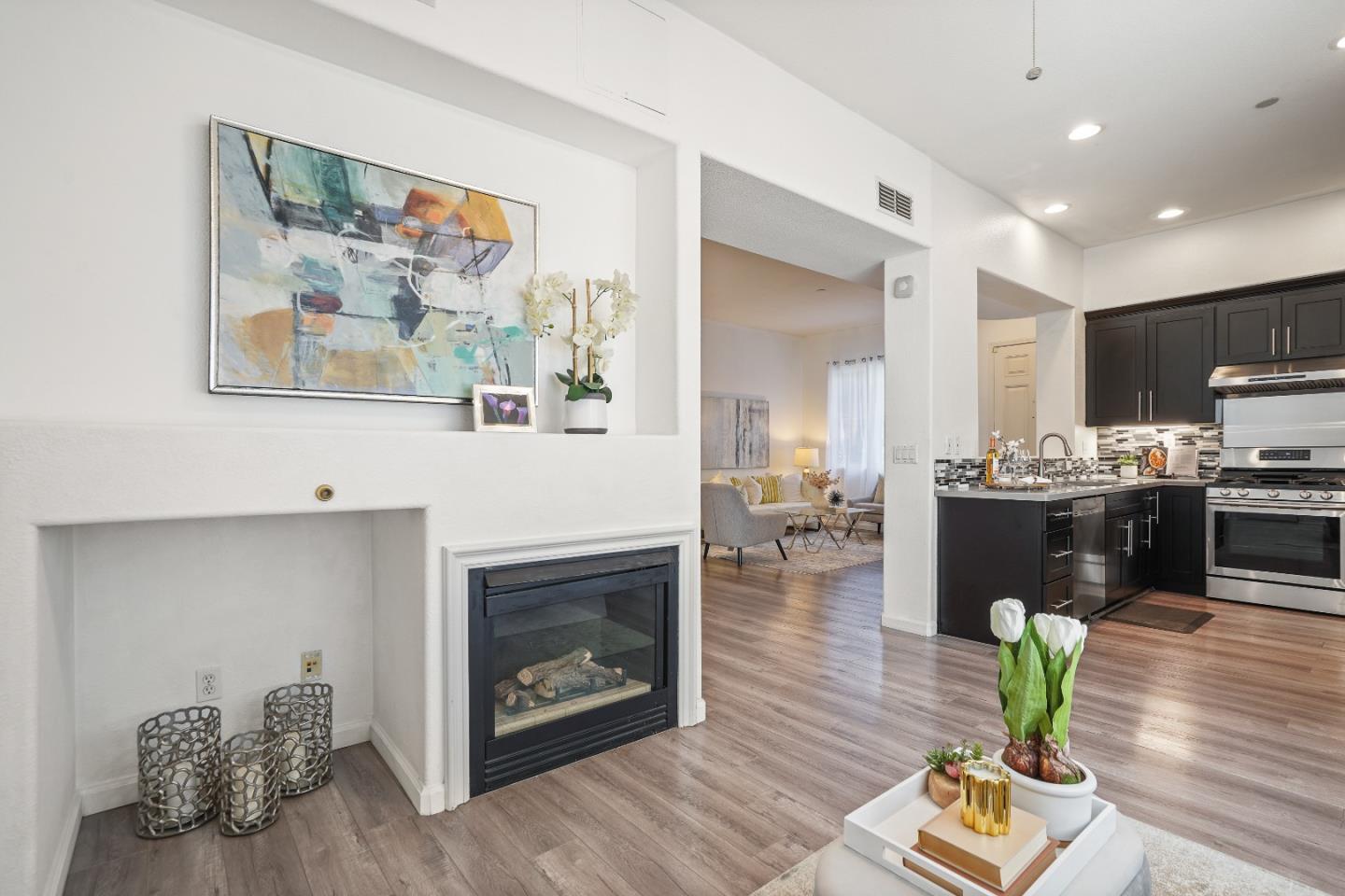 894 Fascination Place Milpitas, CA 95035 - Photo 9 of 30 a living room with furniture and a fireplace