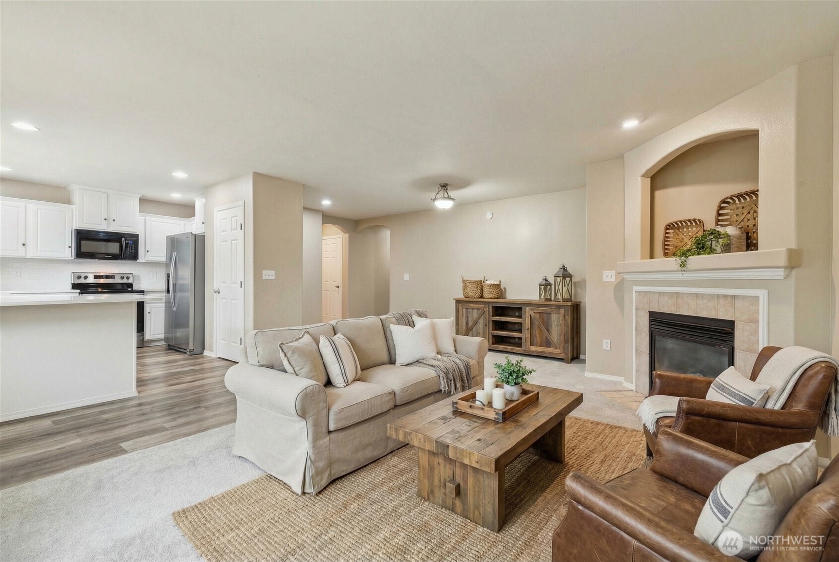 323 Helen Street Sedro-Woolley, WA 98284 - Photo 9 of 34 a living room with furniture and a fireplace
