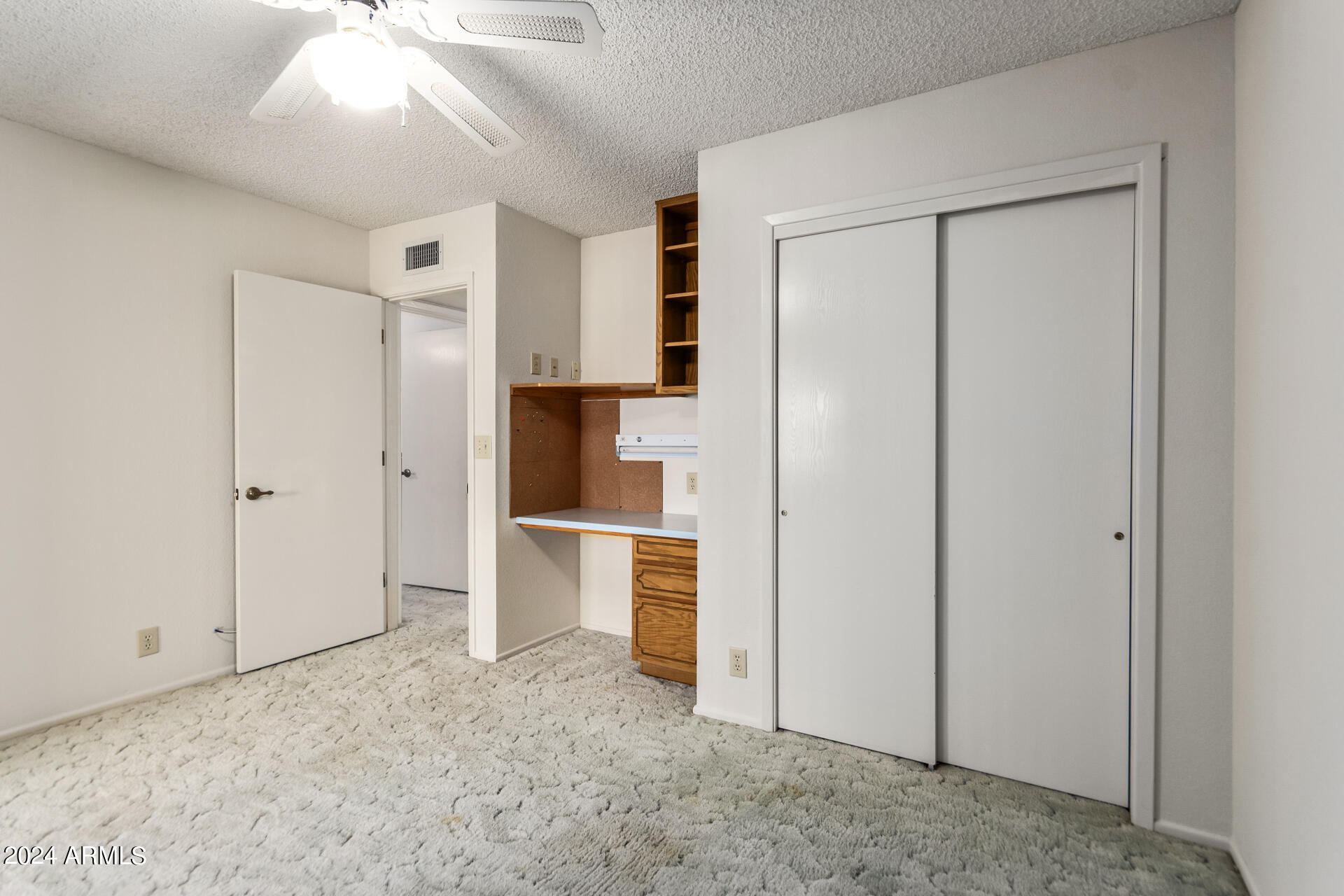 520 South Greenfield Road, Unit 39 Mesa, AZ 85206 - Photo 13 of 19 a view of kitchen with furniture and refrigerator