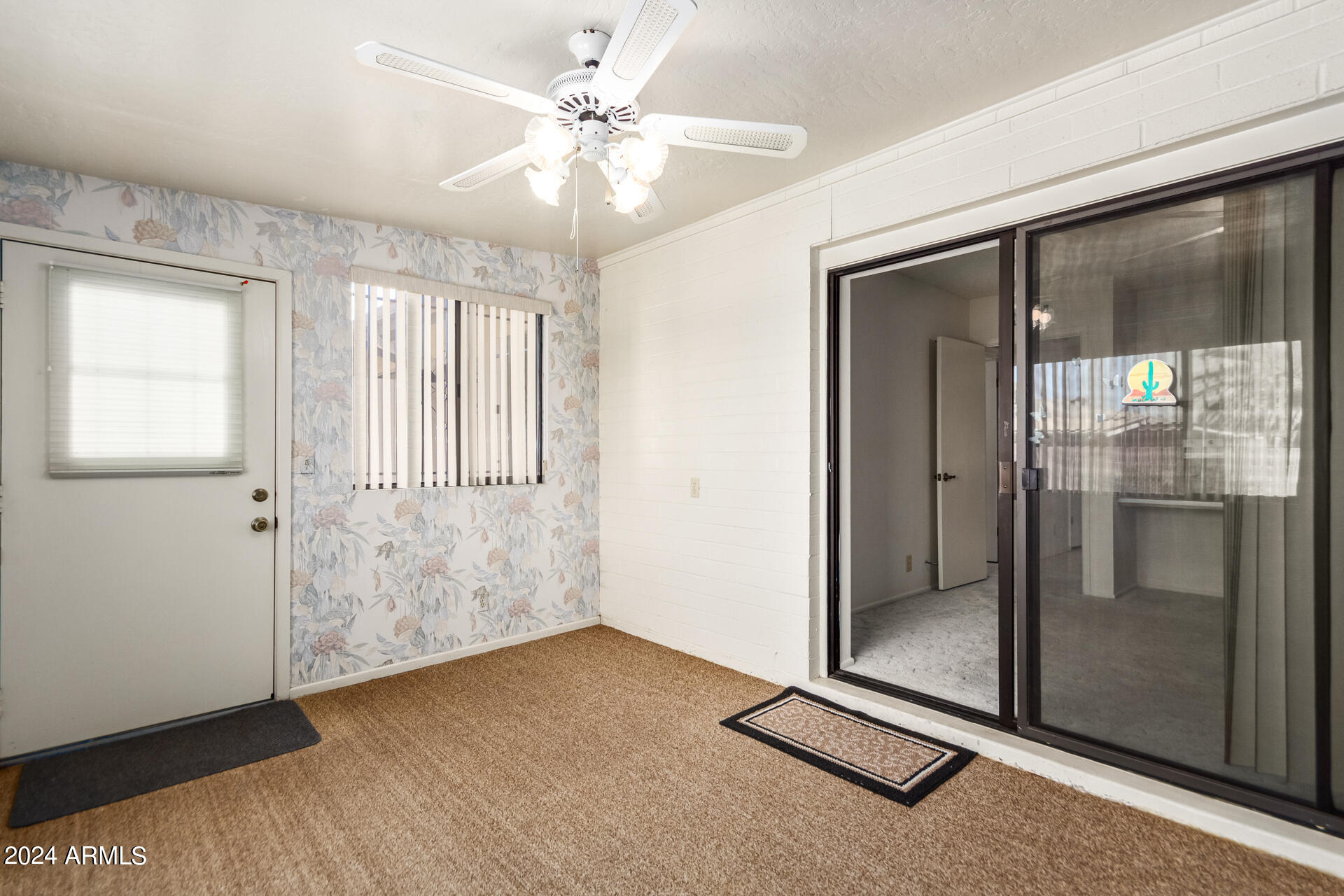 520 South Greenfield Road, Unit 39 Mesa, AZ 85206 - Photo 14 of 19 an empty room with windows and closet