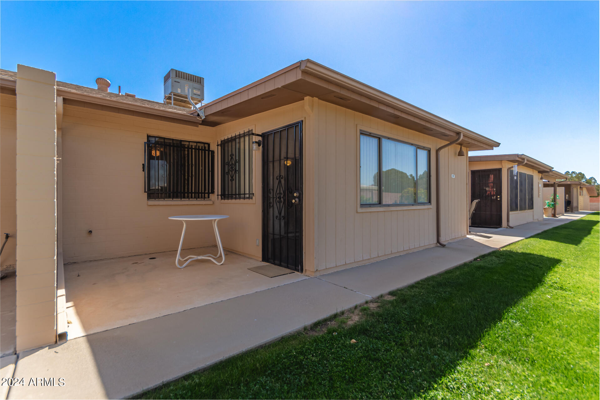 520 South Greenfield Road, Unit 39 Mesa, AZ 85206 - Photo 18 of 19 a front view of a house with a yard
