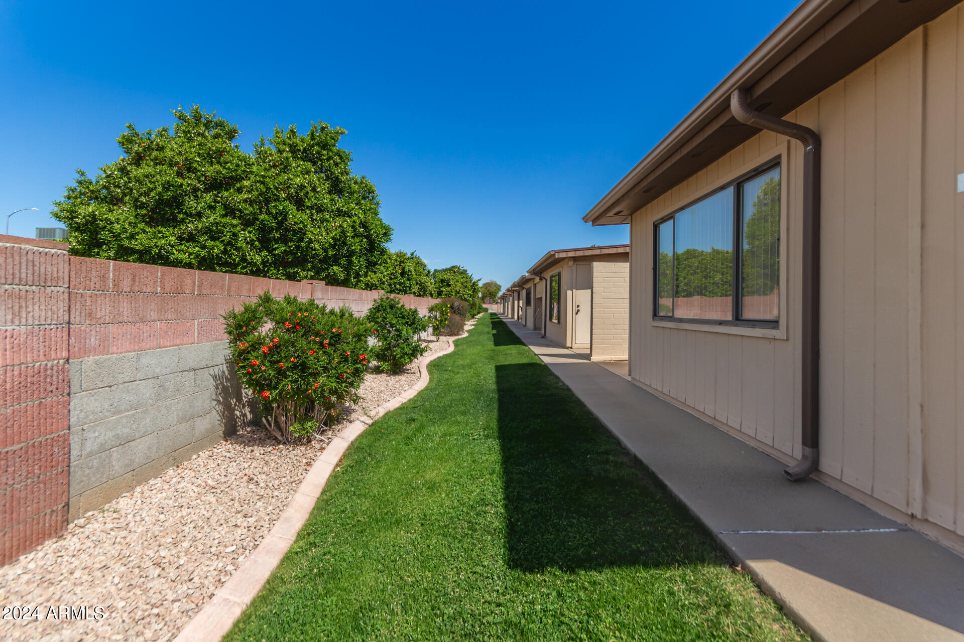 520 South Greenfield Road, Unit 39 Mesa, AZ 85206 - Photo 19 of 19 a view of house with backyard