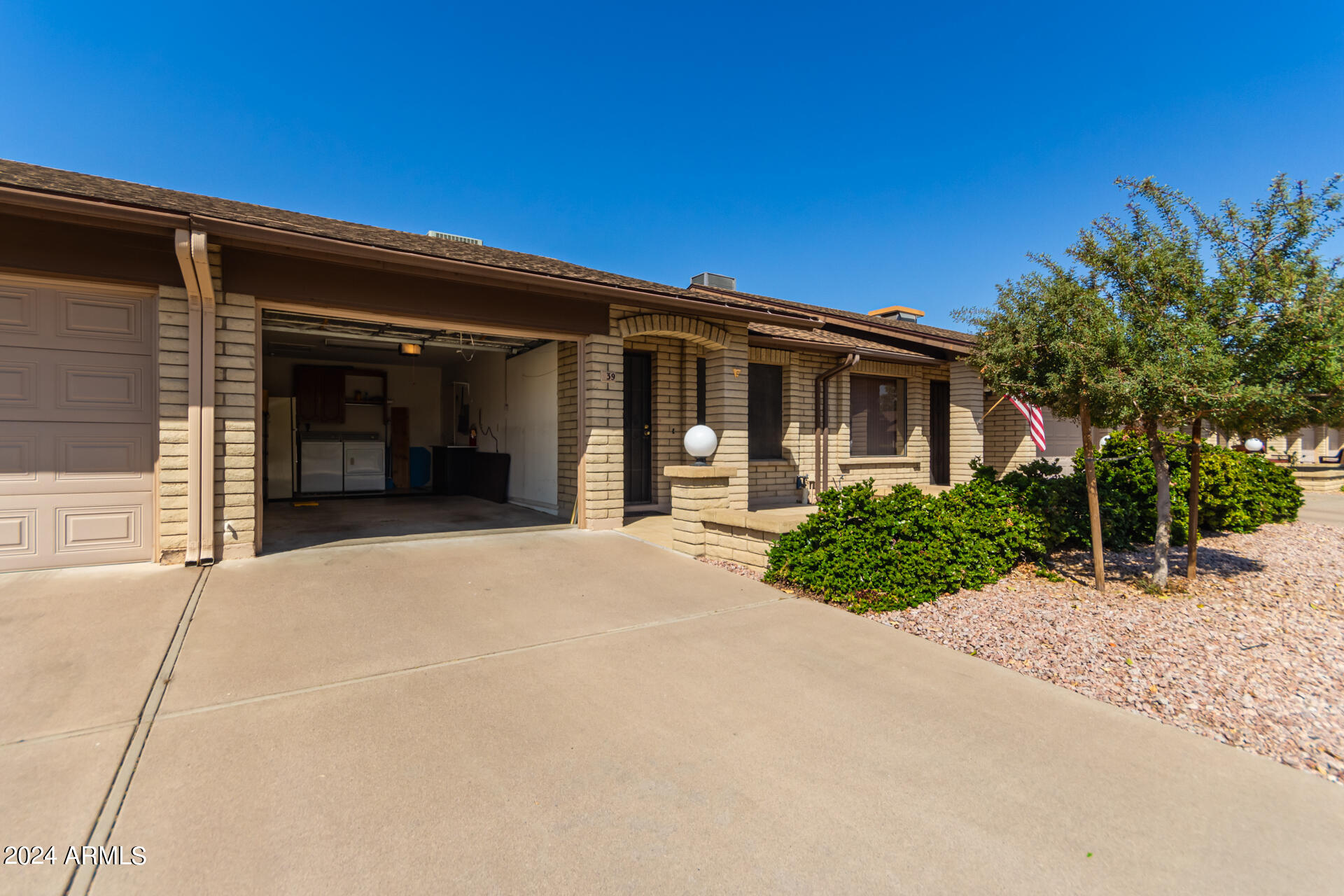 520 South Greenfield Road, Unit 39 Mesa, AZ 85206 - Photo 2 of 19 front view of a house with a yard