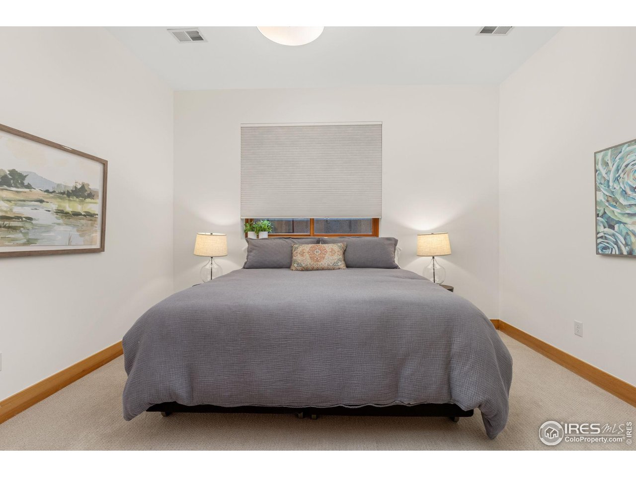 3080 7th Street Boulder, CO 80304 - Photo 33 of 50 Generously sized basement bedroom (king size bed shown). There is another room in the basement that is non-conforming (no closet) that can also be used as a bedroom.