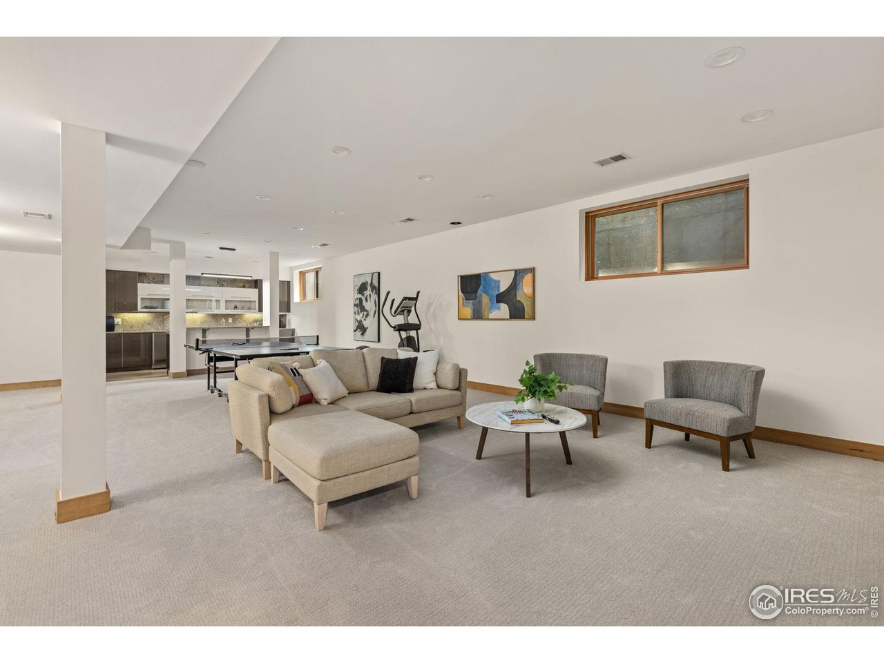 3080 7th Street Boulder, CO 80304 - Photo 35 of 50 View of family room with new carpet looking toward the wet bar.