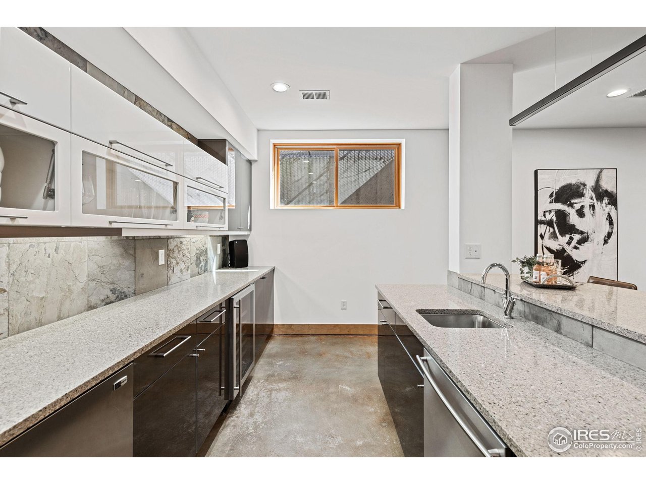 3080 7th Street Boulder, CO 80304 - Photo 36 of 50 Basement kitchenette/wet bar, includes dishwasher, 2 mini-fridges, sink and plenty of cabinets.