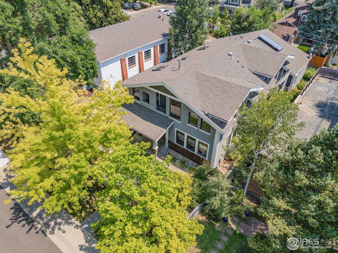 3080 7th Street Boulder, CO 80304 - Photo 42 of 50 Front drone view with mature trees.