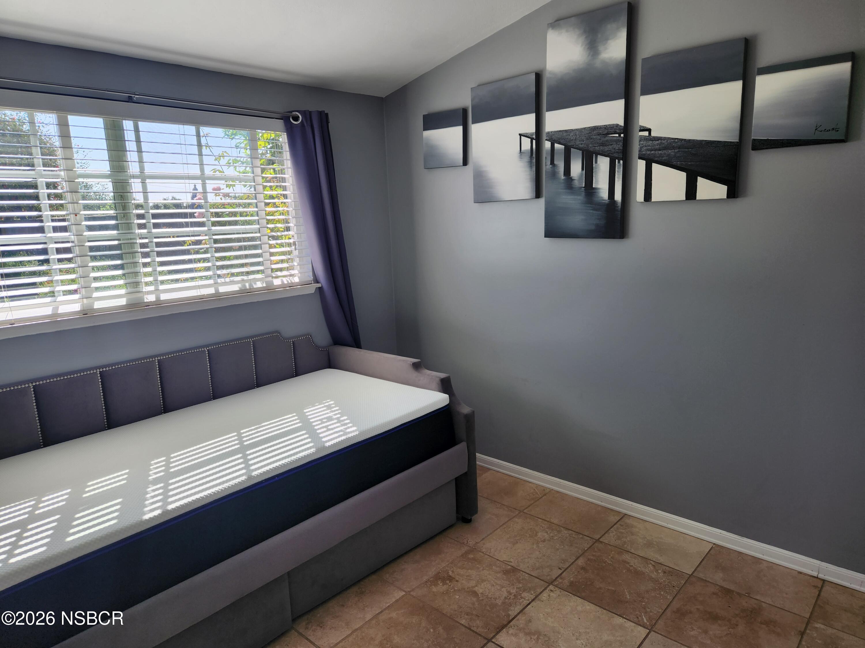 3770 Rucker Road Lompoc, CA 93436 - Photo 16 of 36 a room with a bed and a window