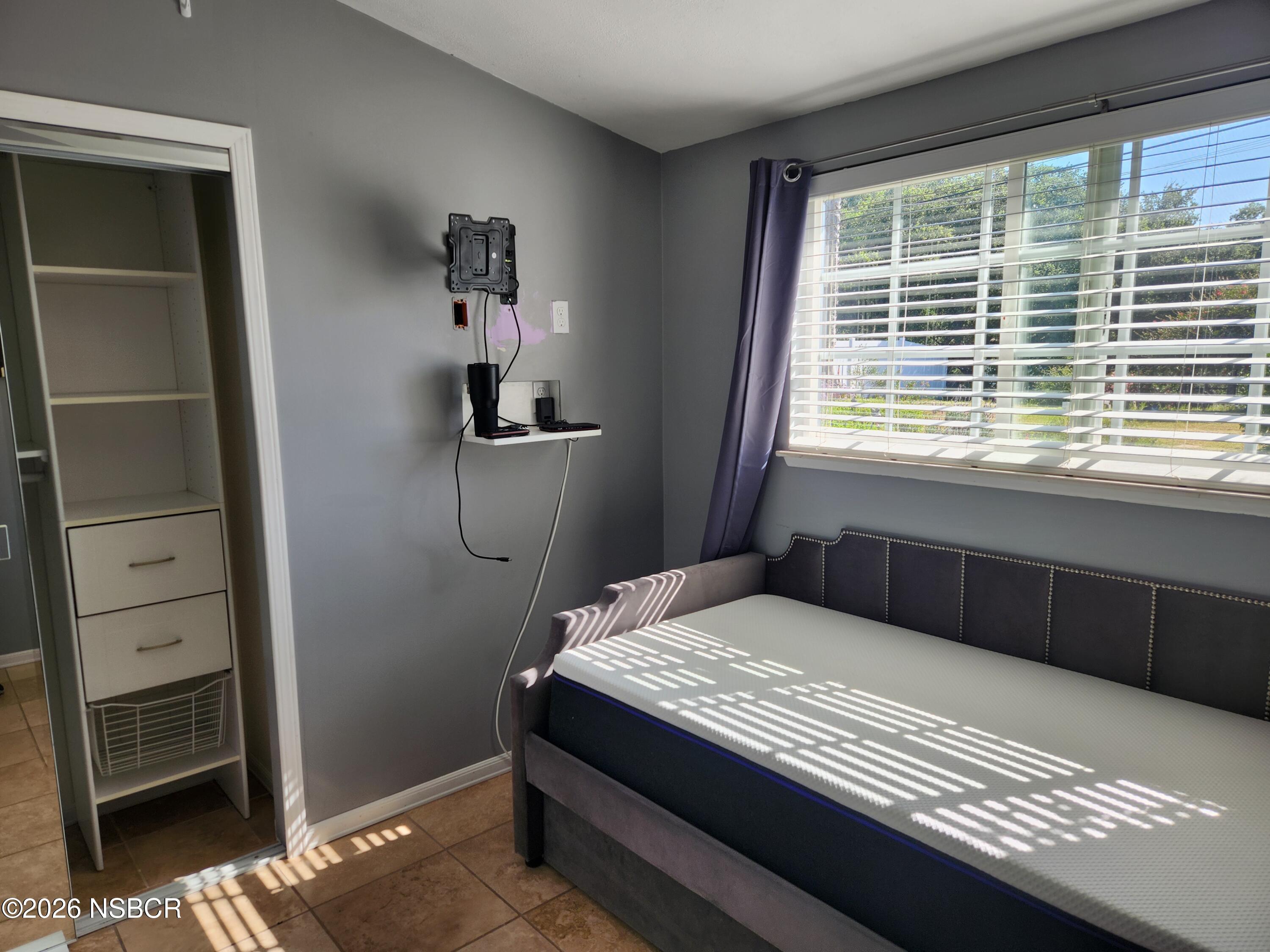 3770 Rucker Road Lompoc, CA 93436 - Photo 17 of 36 a bedroom with a bed and a window