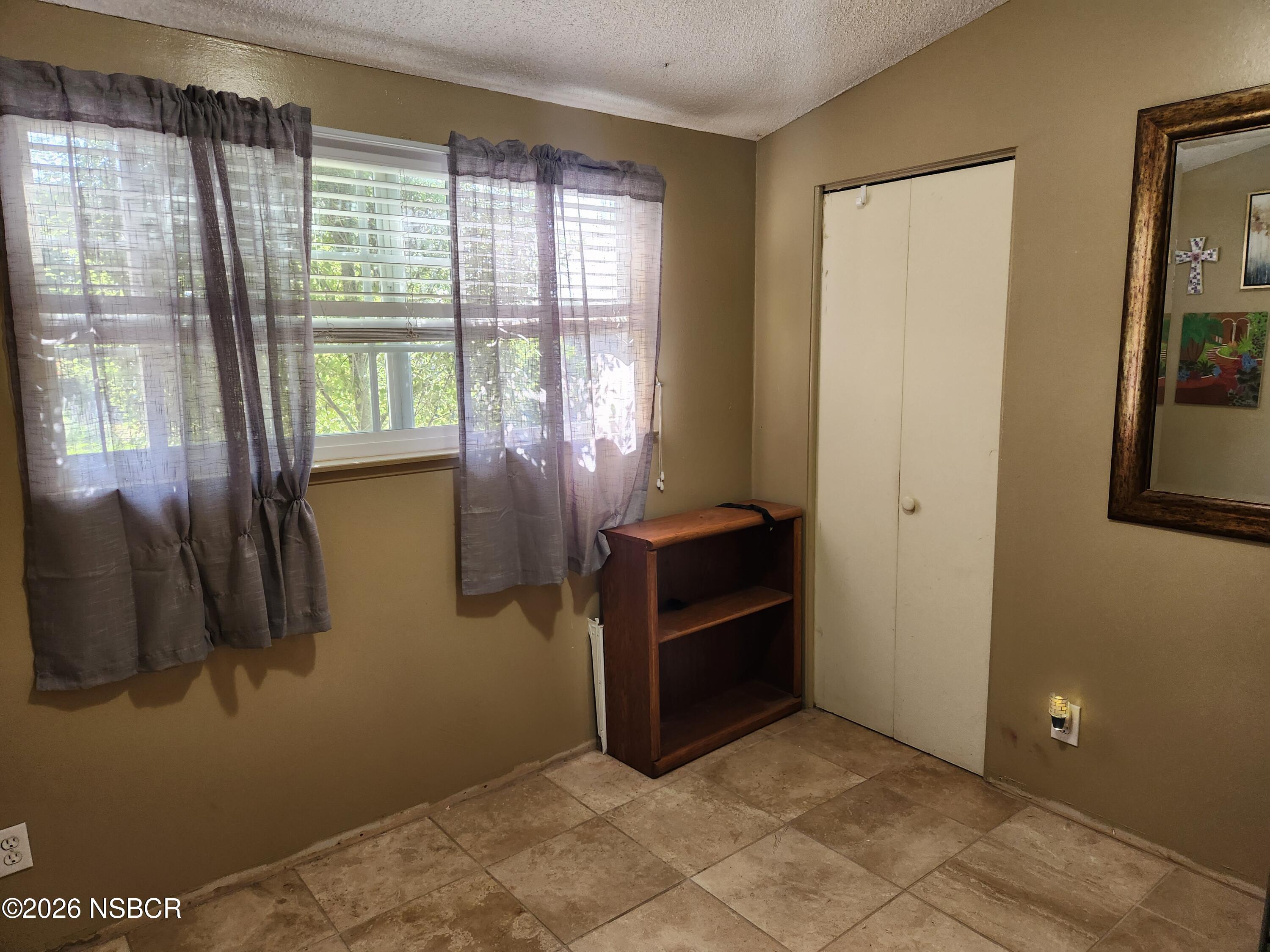 3770 Rucker Road Lompoc, CA 93436 - Photo 19 of 36 a view of livingroom with furniture and windows