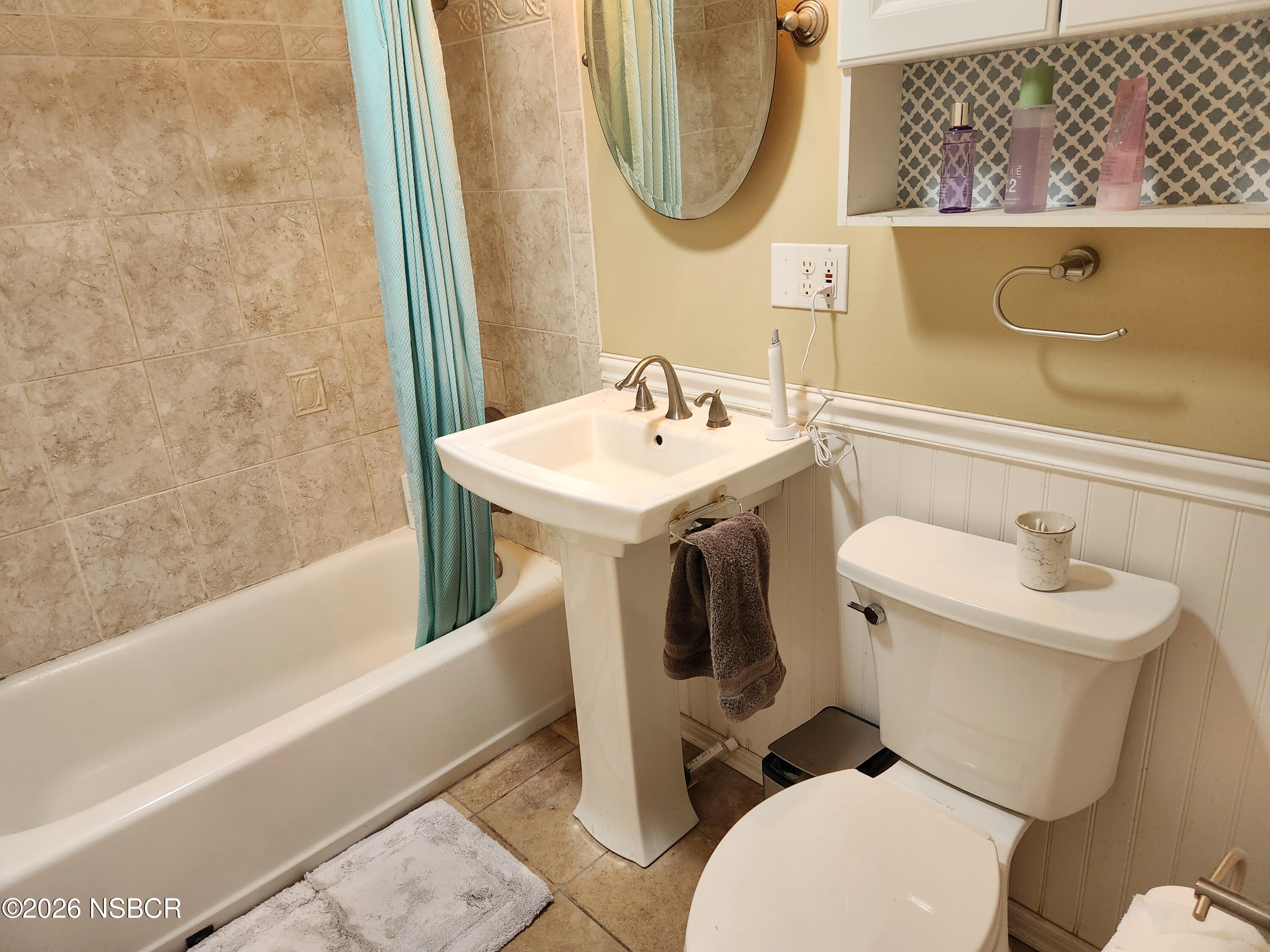 3770 Rucker Road Lompoc, CA 93436 - Photo 20 of 36 a bathroom with a sink a toilet and a bathtub