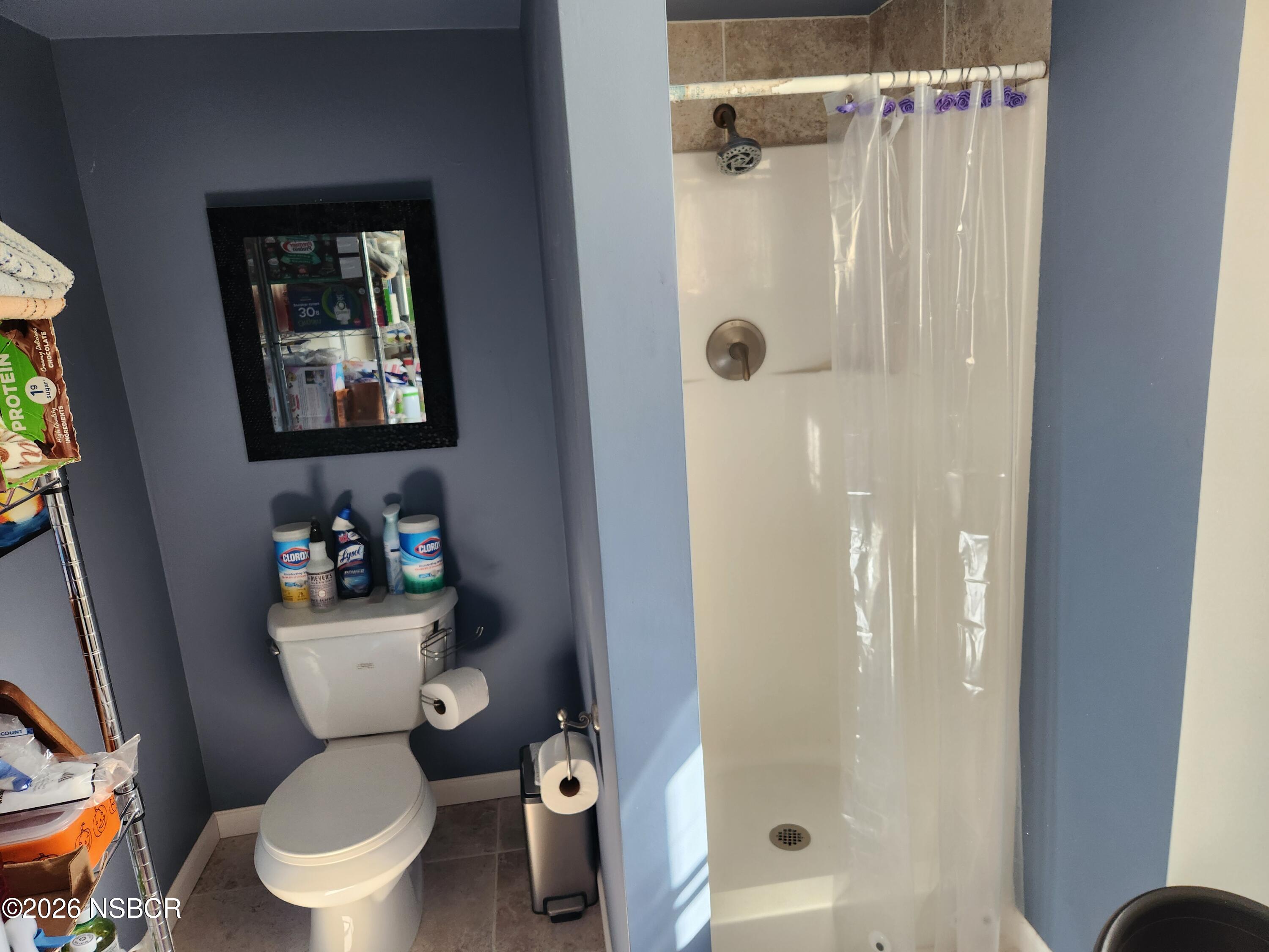 3770 Rucker Road Lompoc, CA 93436 - Photo 22 of 36 a white toilet sitting next to a bathroom sink