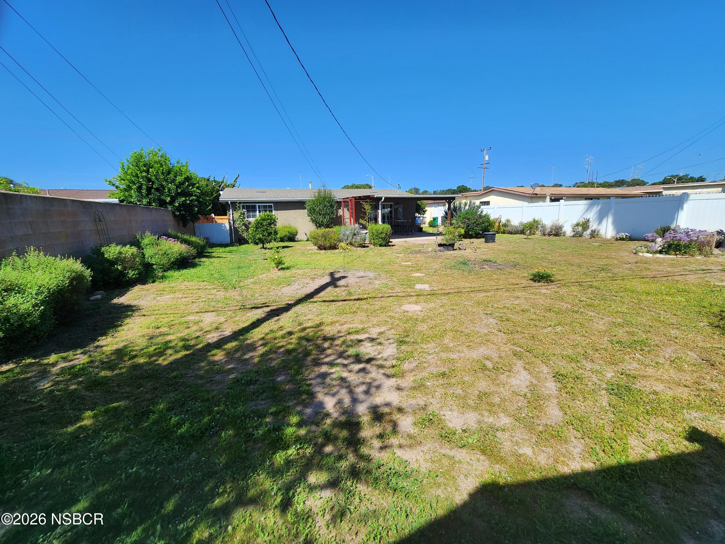 3770 Rucker Road Lompoc, CA 93436 - Photo 26 of 36 a view of a yard with an house