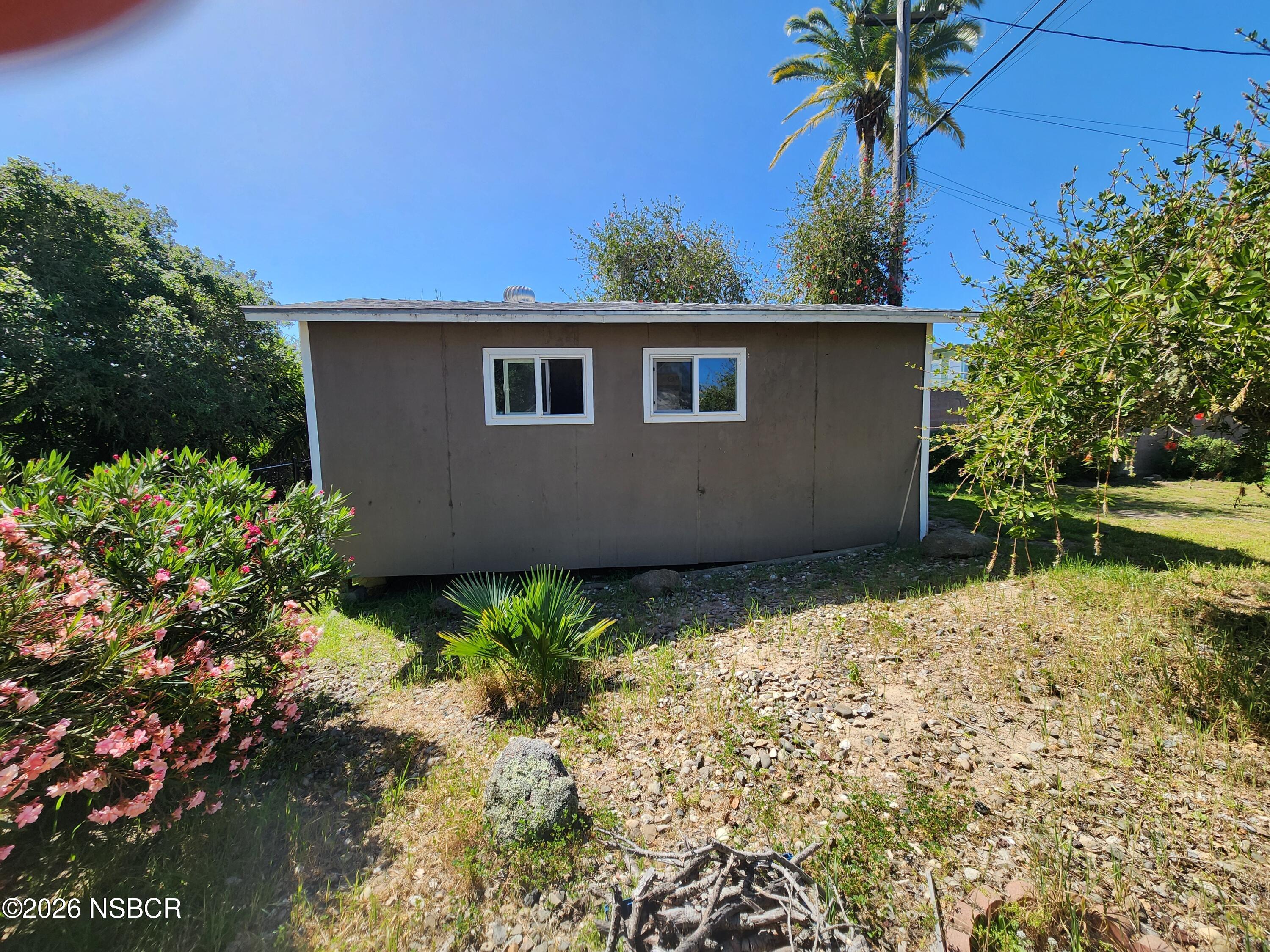 3770 Rucker Road Lompoc, CA 93436 - Photo 28 of 36 a house with a tree in front of it