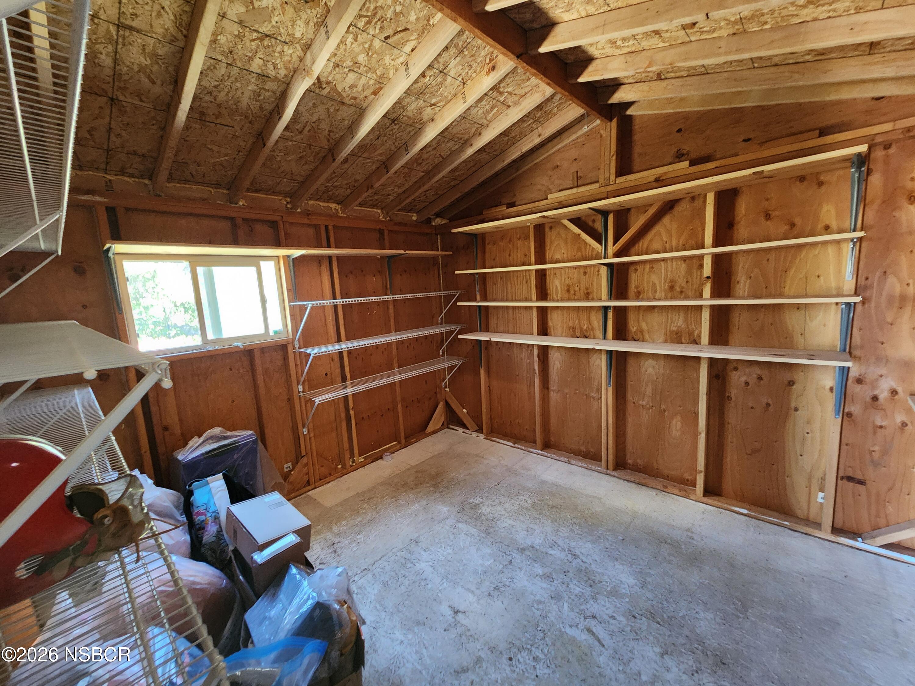 3770 Rucker Road Lompoc, CA 93436 - Photo 29 of 36 a view of a room with wooden shelves