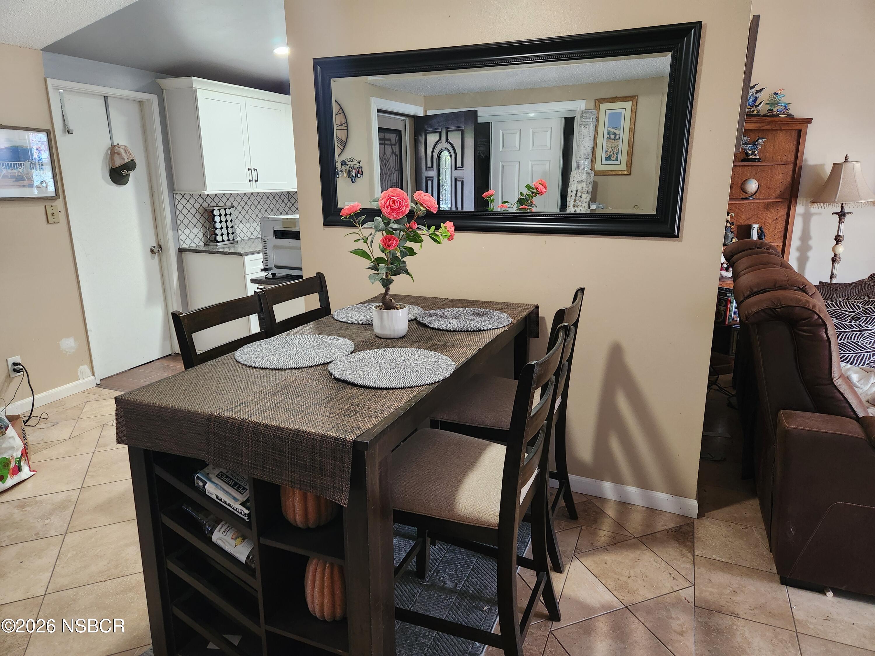 3770 Rucker Road Lompoc, CA 93436 - Photo 10 of 36 a view of a dining room with furniture and window