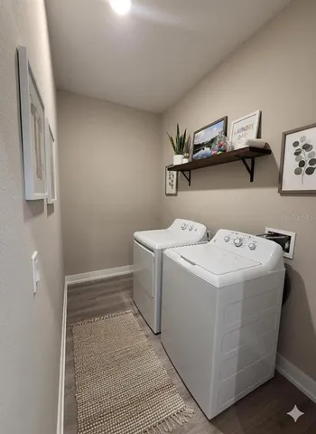 a utility room with dryer and washer