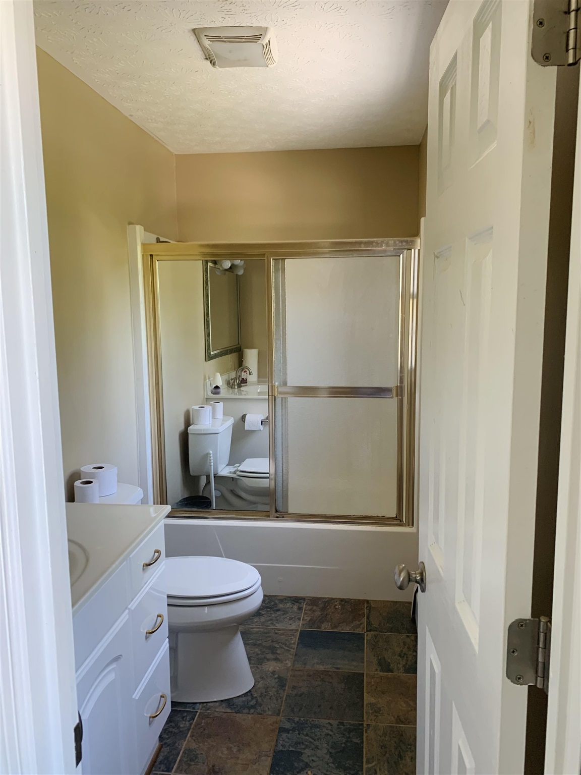 197 Kindig Road Waynesboro, VA 22980 - Photo 13 of 17 a bathroom with a granite countertop sink mirror vanity and toilet