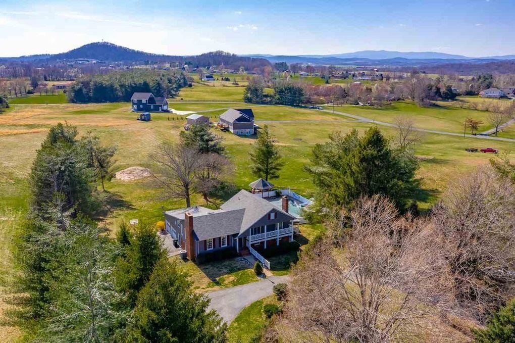 197 Kindig Road Waynesboro, VA 22980 - Photo 2 of 17 a view of a house with a yard and a lake view