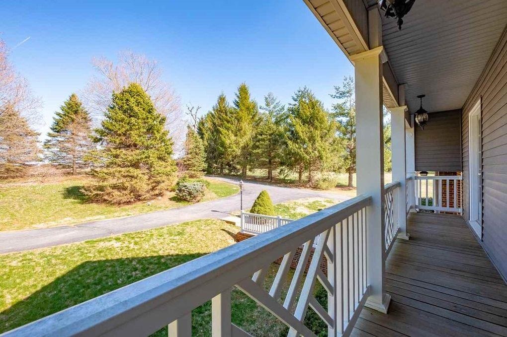 197 Kindig Road Waynesboro, VA 22980 - Photo 4 of 17 a view of a balcony with wooden floor and fence