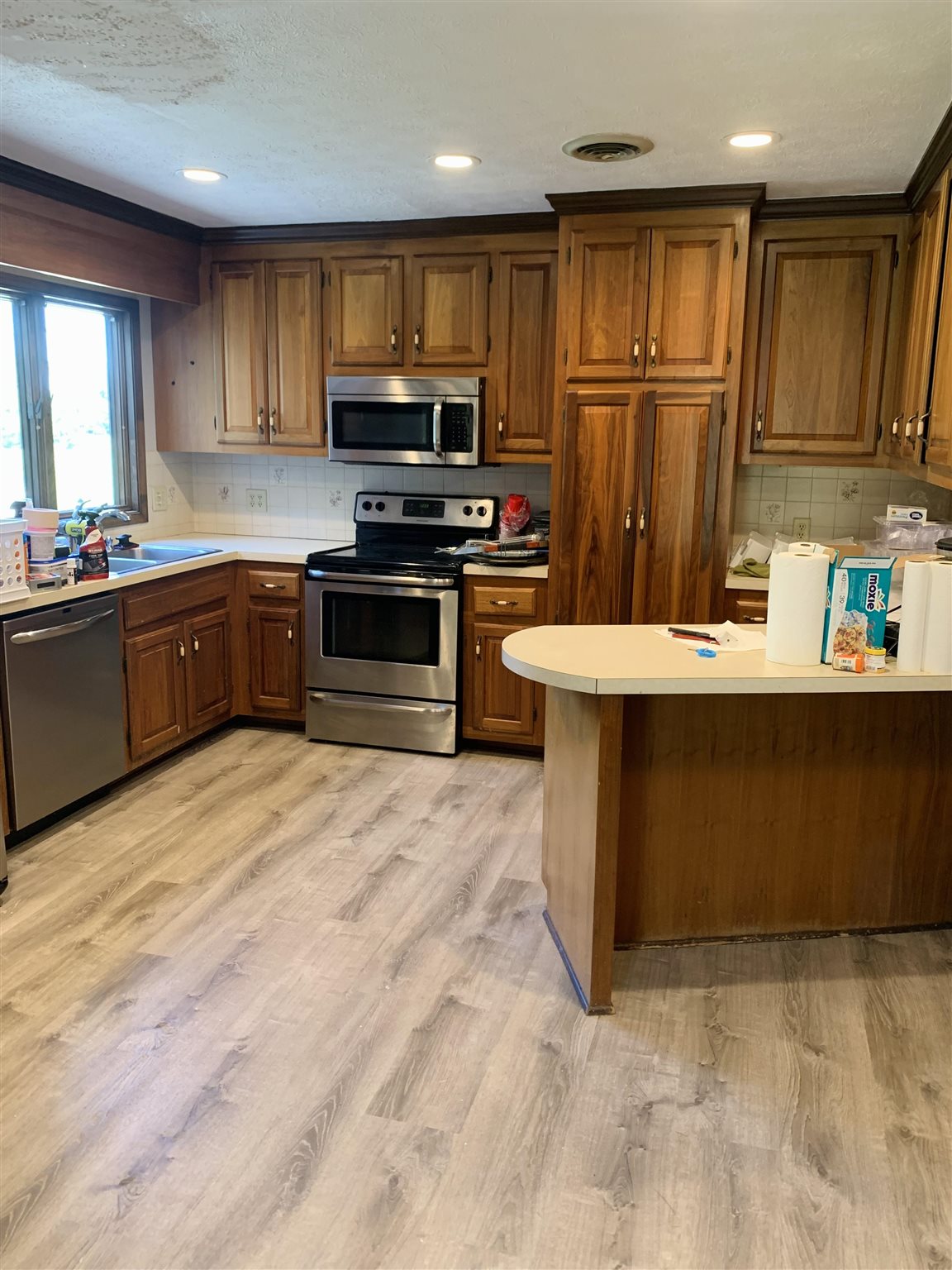 197 Kindig Road Waynesboro, VA 22980 - Photo 6 of 17 a kitchen with stainless steel appliances granite countertop a refrigerator stove top oven a sink and dishwasher