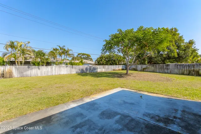 a view of outdoor space with trees all around