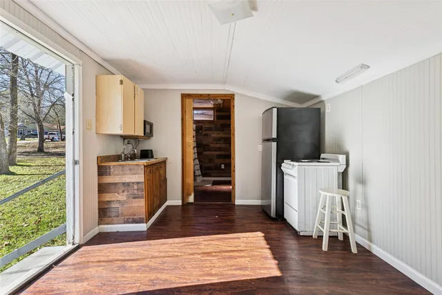 a bathroom with a toilet a sink and a shower