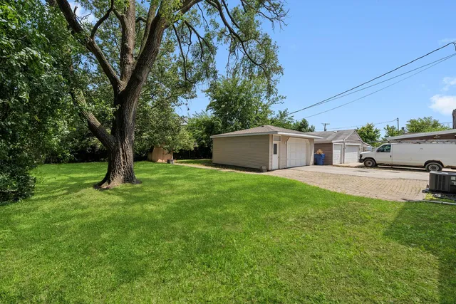 a view of a backyard with a garden