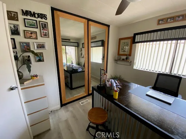 a workspace with furniture and window