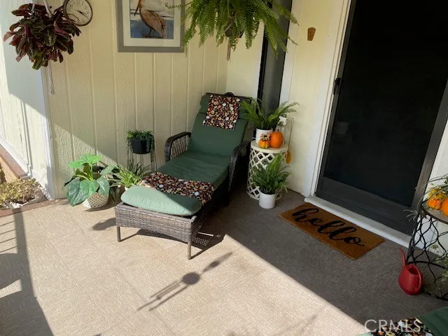 a view of a chairs and table in the patio
