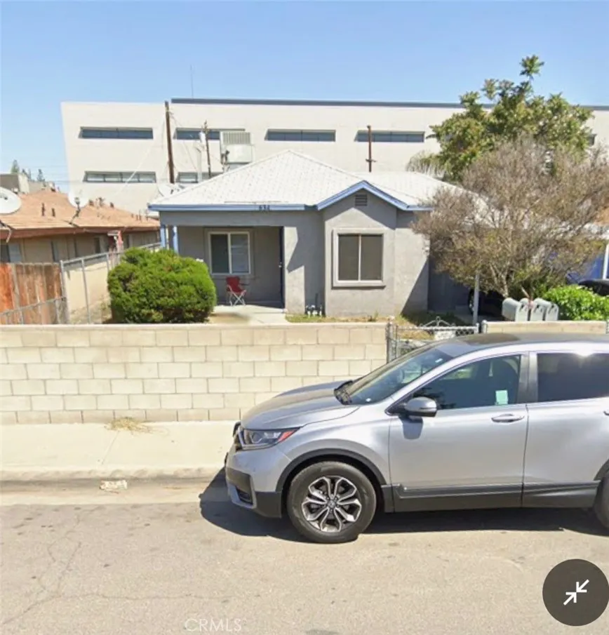 a front view of a house with parking