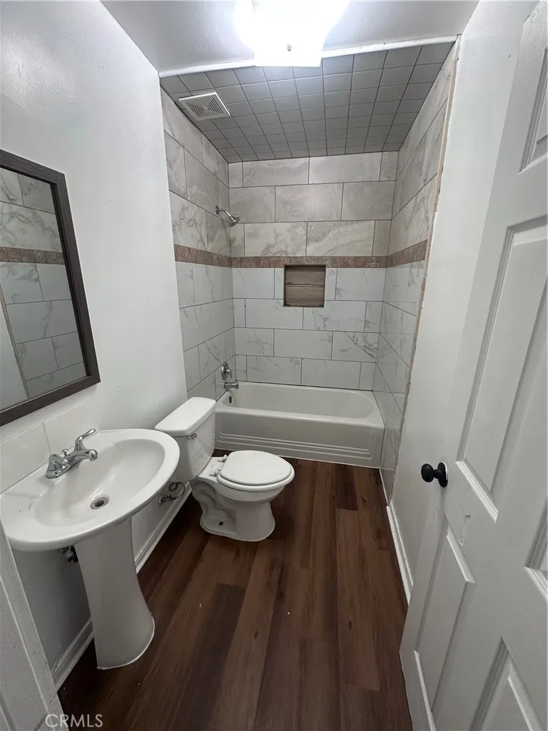634 33rd Street Bakersfield, CA 93301 - Photo 11 of 39 a bathroom with a sink and a mirror
