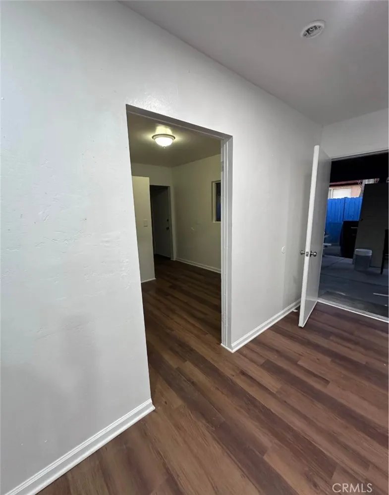 634 33rd Street Bakersfield, CA 93301 - Photo 28 of 39 a view of a hallway with wooden floor