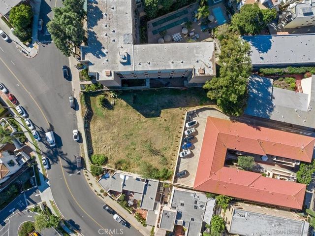 an aerial view of a house with outdoor space