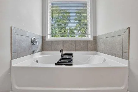 a bathroom with a bathtub