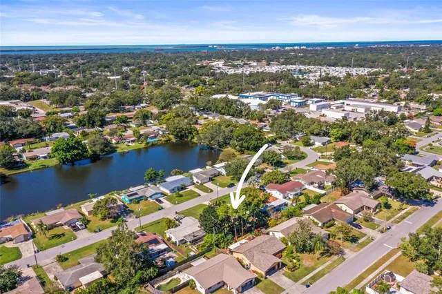 an aerial view of city and lake view