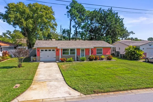 $420,000 | 1215 Lazy Lake Road East, Dunedin, FL 34698