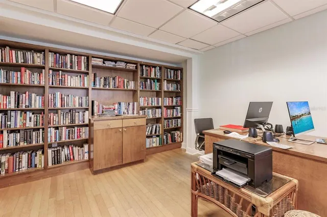 a room with furniture and a book shelf