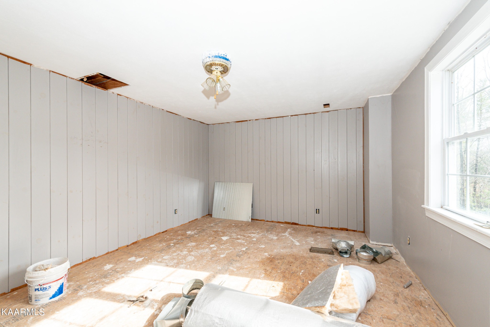 1620 Reliance Road Tellico Plains, TN 37385 - Photo 28 of 59 a view of a room with a window and hardwood floor