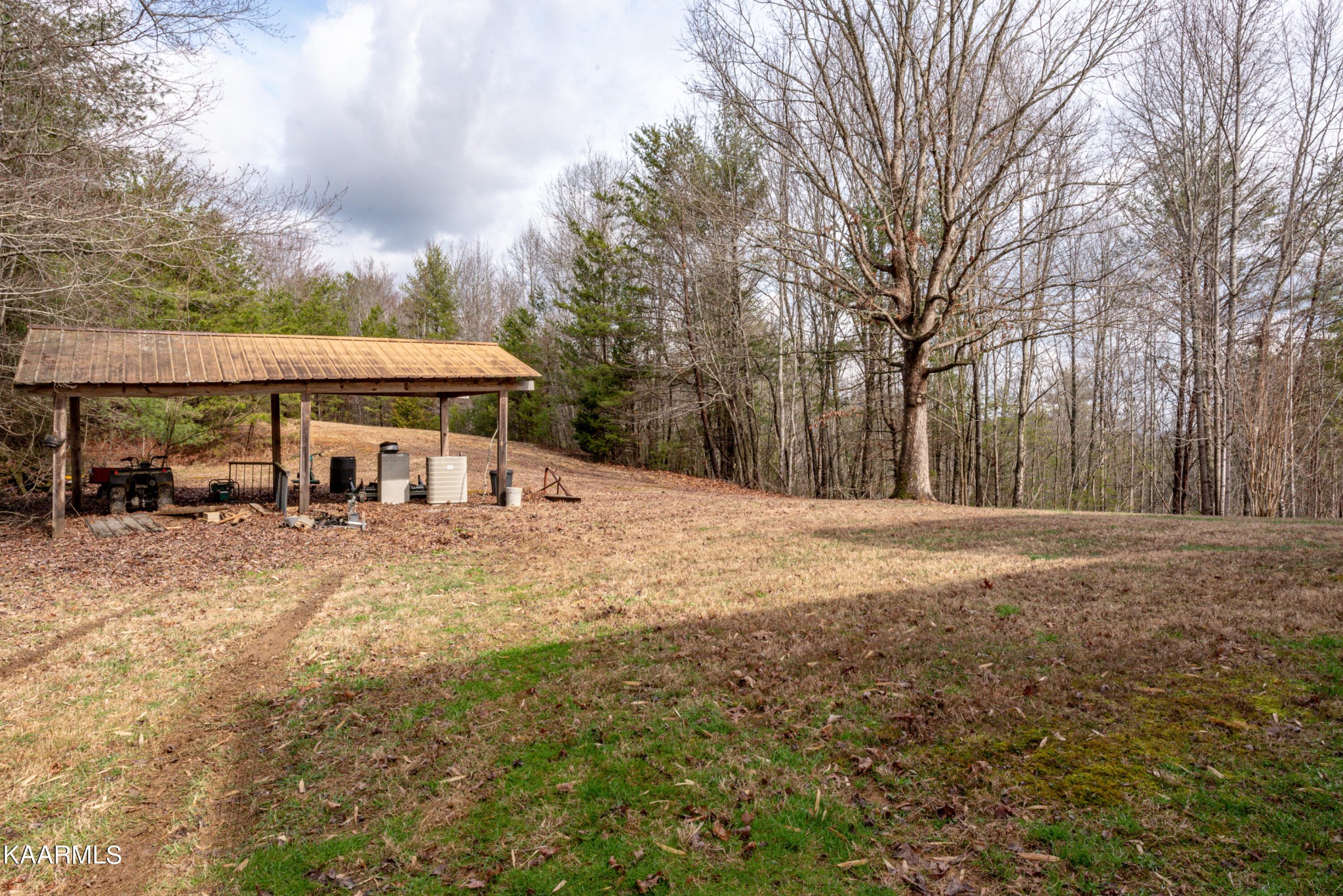 1620 Reliance Road Tellico Plains, TN 37385 - Photo 54 of 59 a view of a house with backyard and sitting area