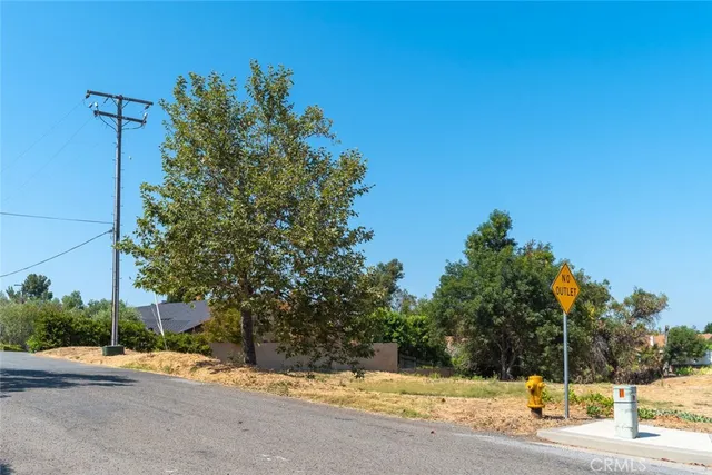 a view of road with a house