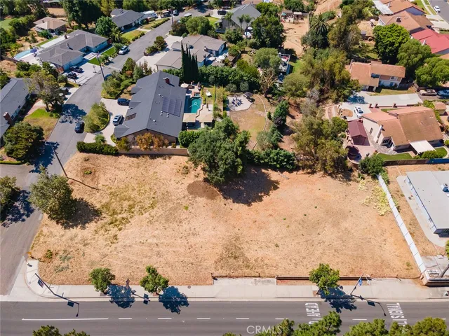 an aerial view of a houses with outdoor space
